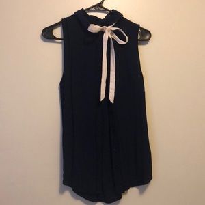 Blue tank with white bow and collar